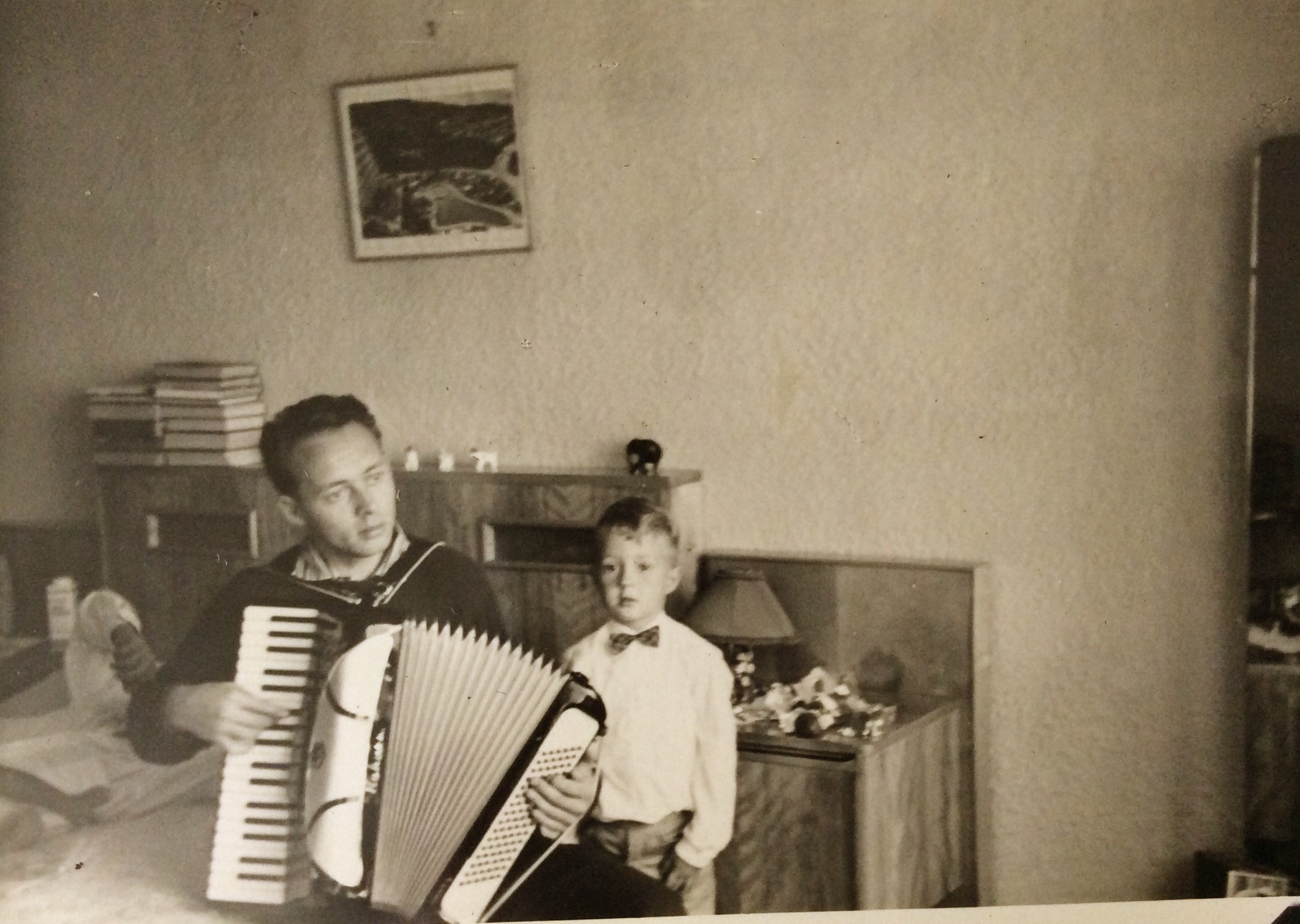Hans playing my accordion....summer 1961....VREDEHOEK....