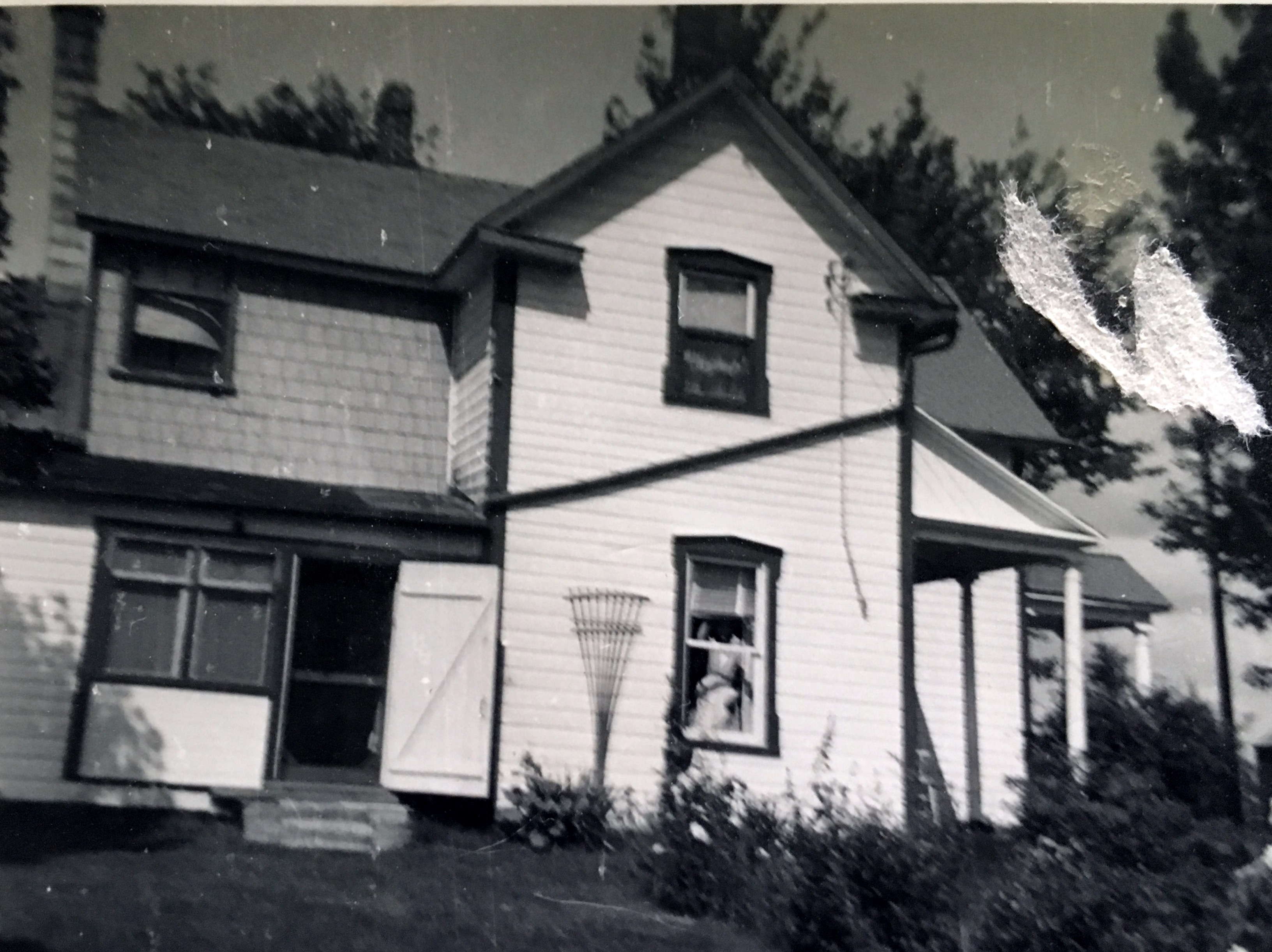 Another side view of Uncle Emile Pomainville’s home located in Limoges, Ontario, Canada.  1930's
