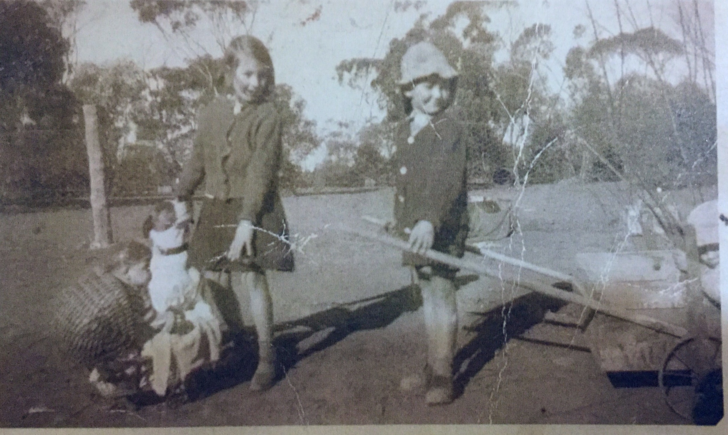 Shirley, Malcolm and Enid (in Billy cart) Taken at Benhar Benanee about 1943.