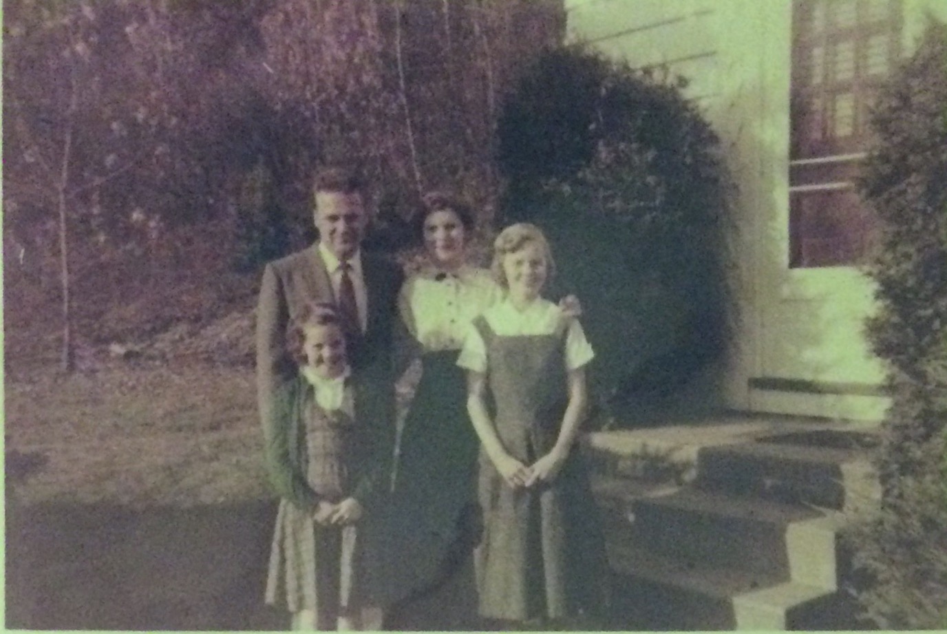 Glenn, Arline, Pat and Karen circa late 1950s, outside Felix and Eleanor Mira's house (in Pennsylvania?)