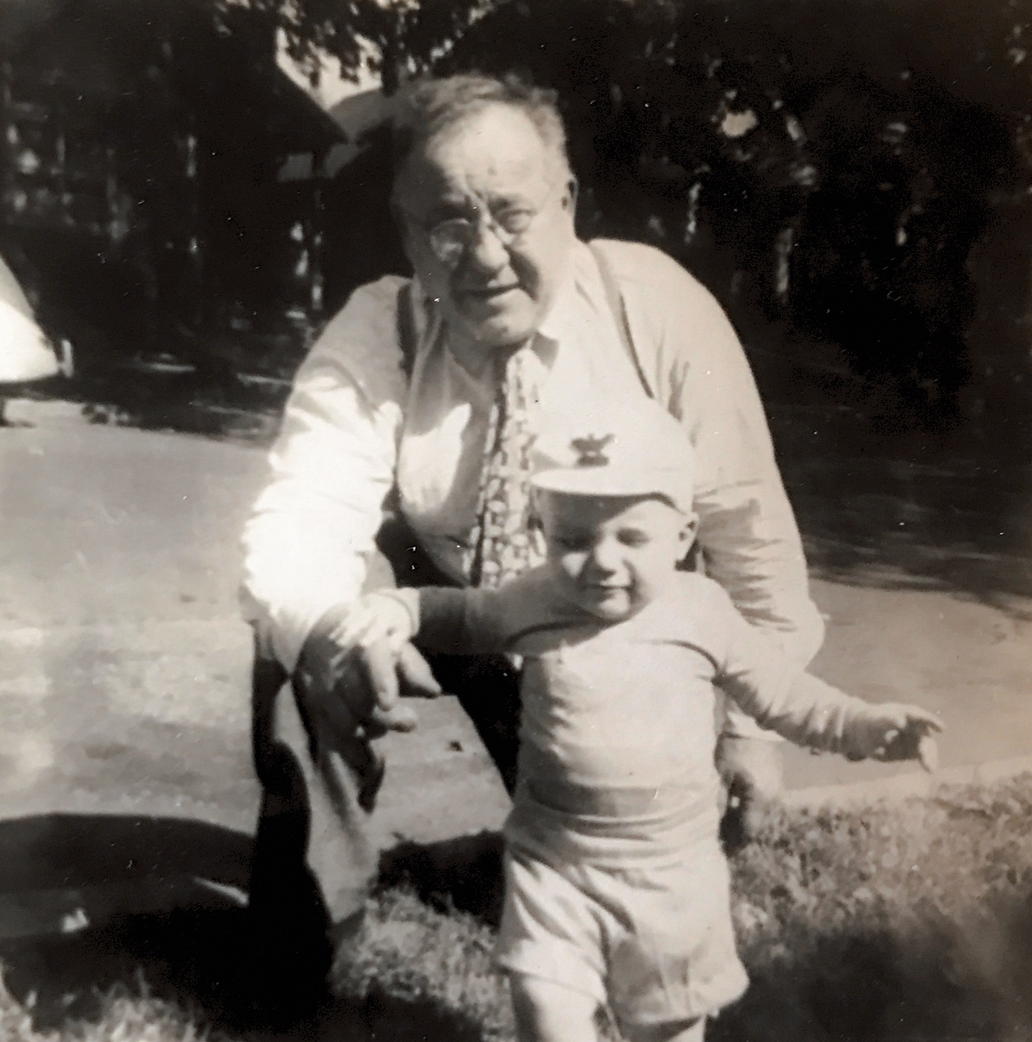 Sept. 1944 9 1/2 mo. With Grandpa Gus.