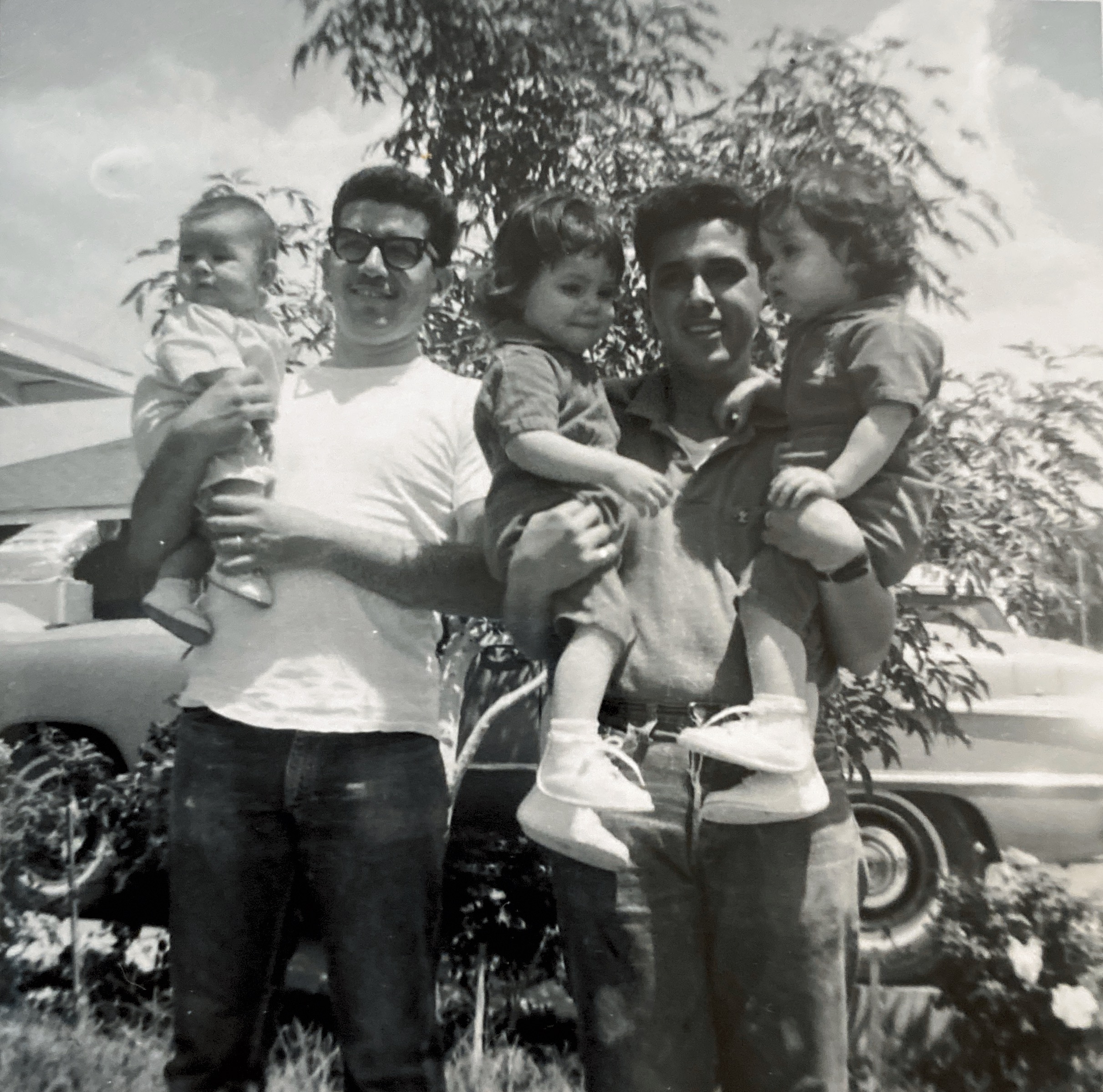Dad and Uncle Robert. Gloria, Missy and La. 6/1966