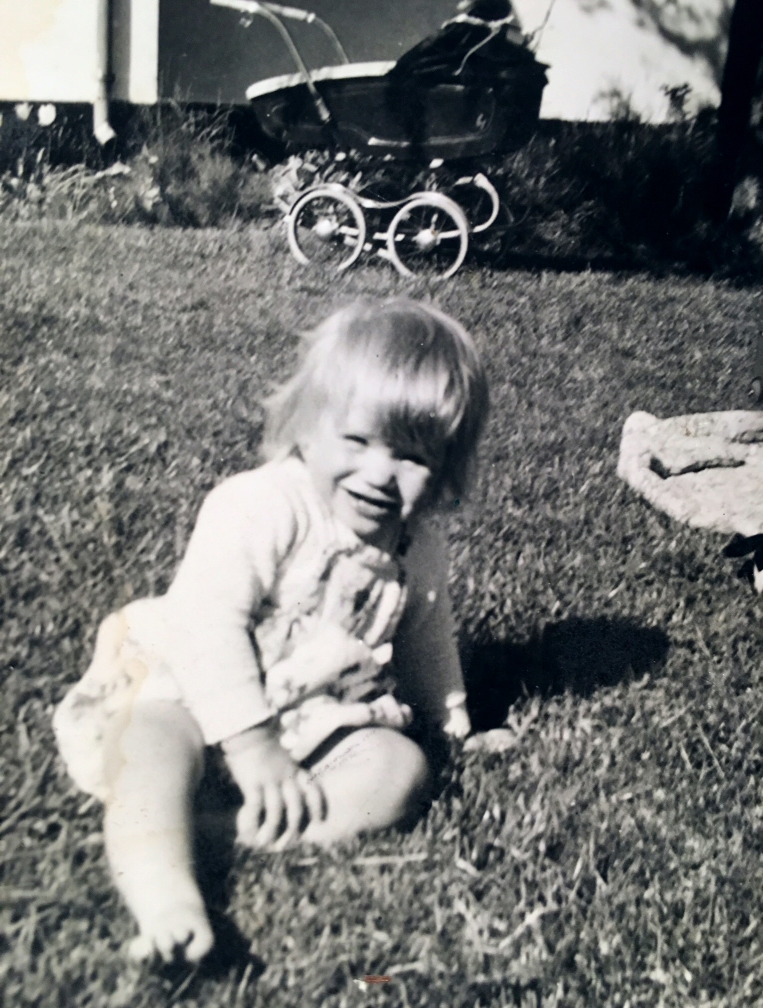 Me (about 2 years old) in the frontgarden of our house