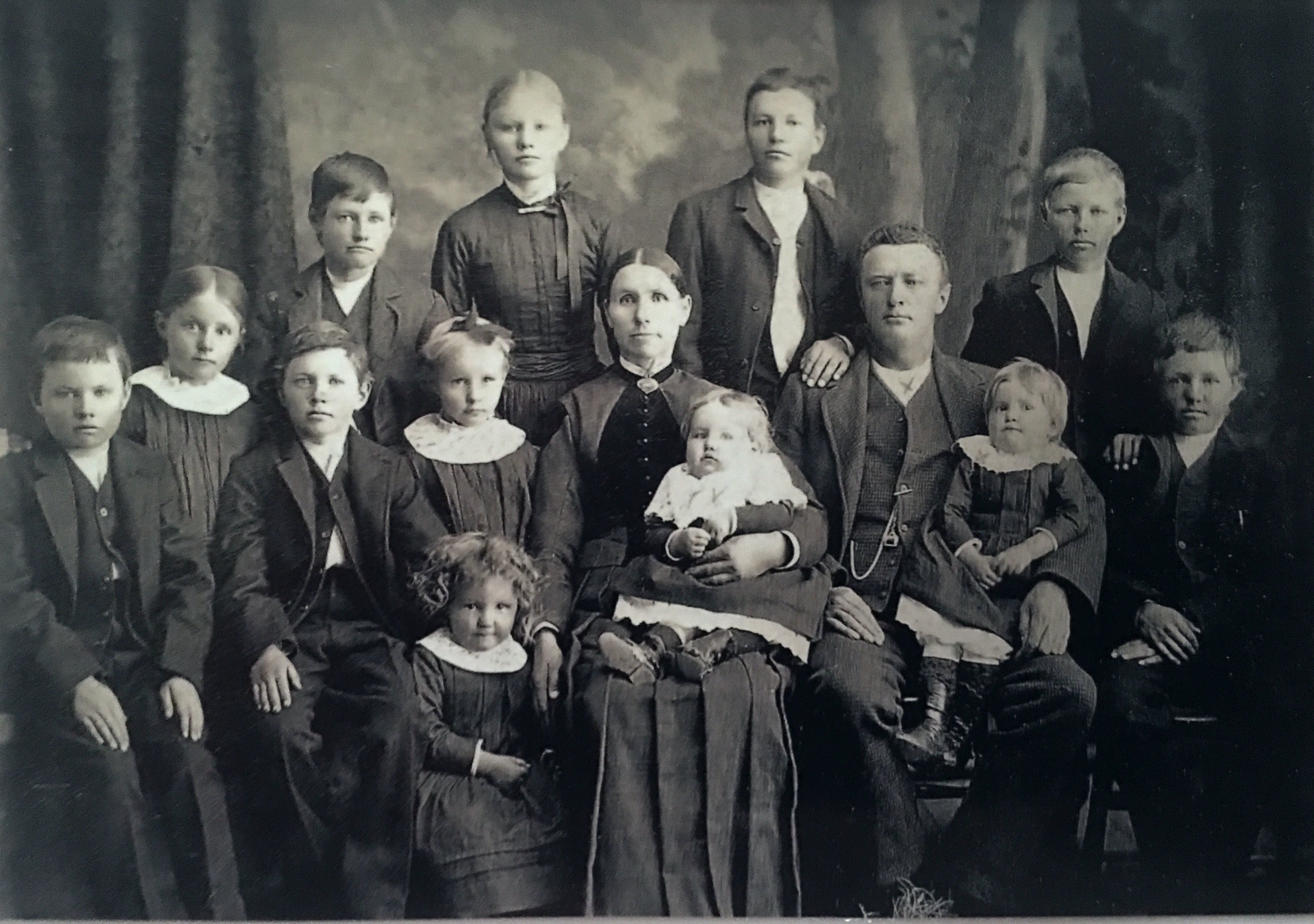 Andrew Johnson, wife Mette Christina, and their 12 children, immigrants from Denmark,.  Photo taken ca 1887. These are my great grandparents.