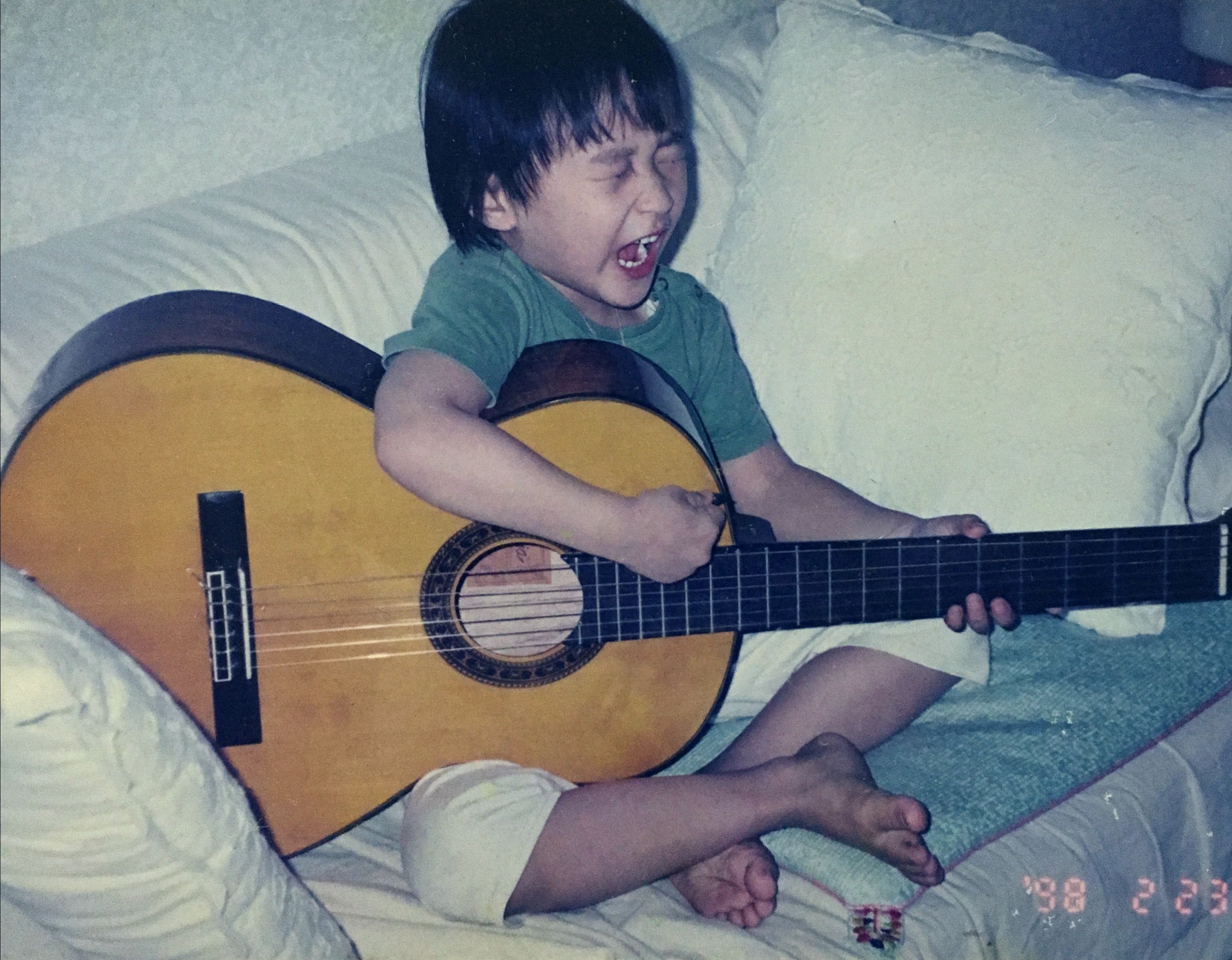 My cute babe. She’s playing guitar.  This photo was taken 17years ago. 