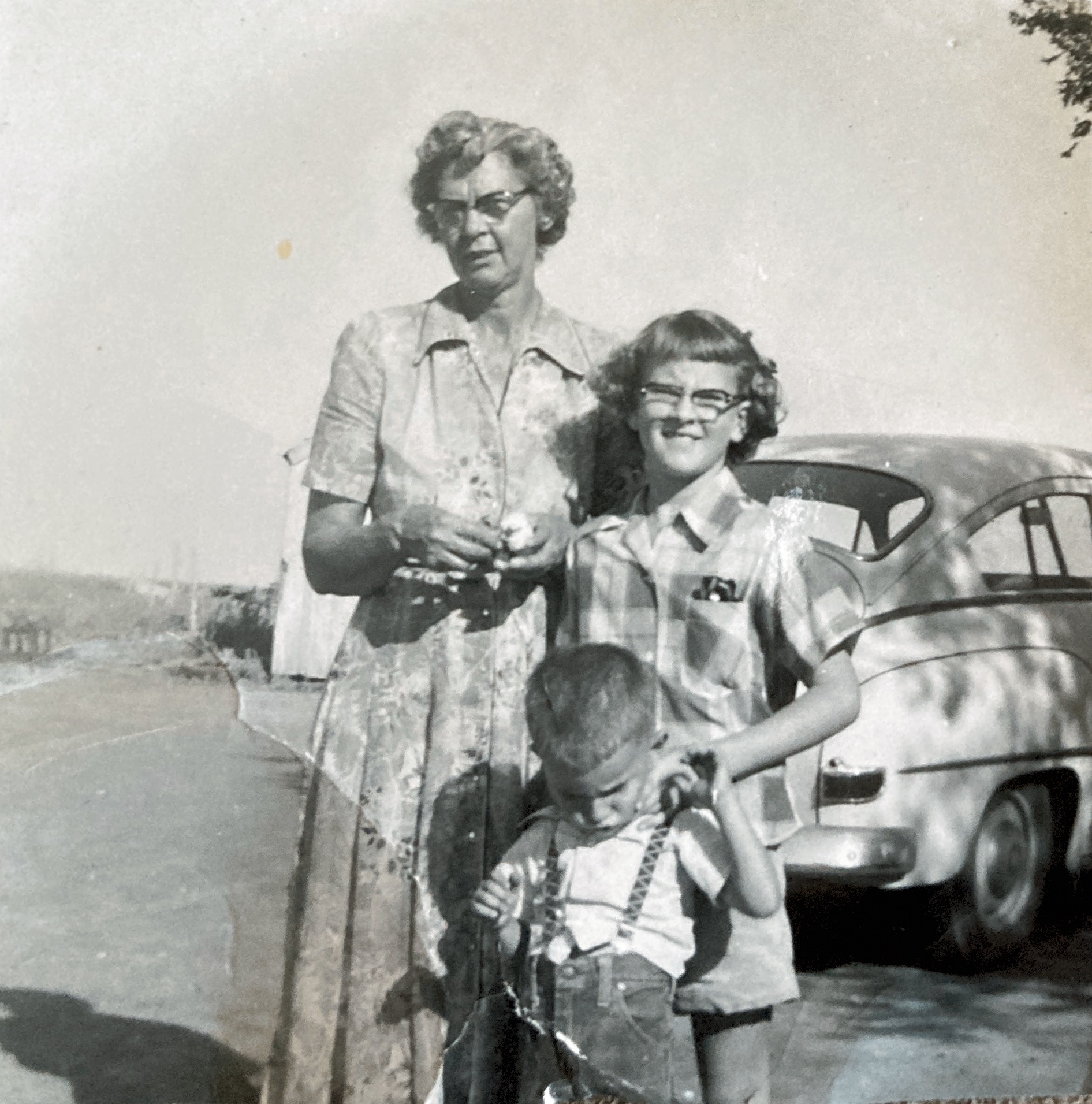 My grandmother, Bessie Francis Wilson Bryan, me (Michal) and my brother Glenn at their Tulia farm about 1954