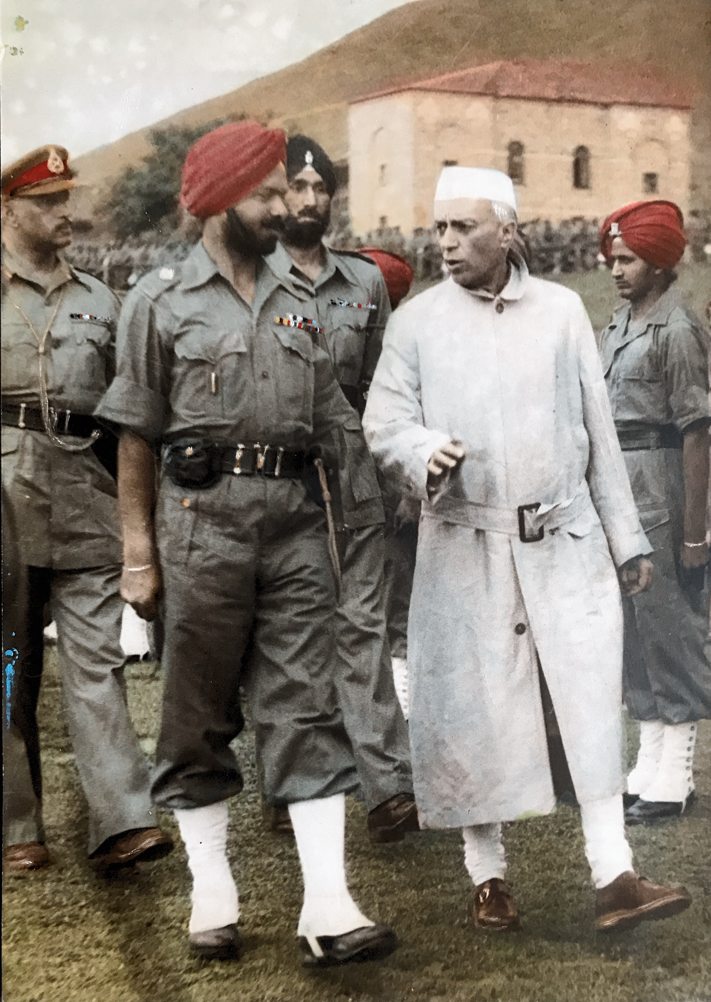 Guard of honour given by 1st Bn The Sikh Regt to the Prime Minister Shri Jawaharlal Nehru at Srinagar (J&K) on 10 May 1948. With the Prime Minister is Major Harwant Singh M.C. and in the rear are Maj Gen KS Thimayya DSO, GOC 19 infantry Division and Lt Col Harbakhsh Singh CO 1  Sikh.
This picture was taken by Preco Studio Srinagar.